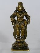 An Indian Vishnu Figure Standing On Lotus Flower
