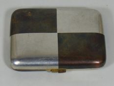 An Art Deco French Silver & Copper Cigarette Case