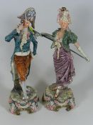 An Antique Pair Of Continental Earthenware Figures