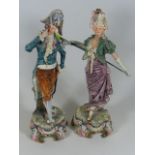 An Antique Pair Of Continental Earthenware Figures