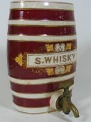An Early 20thC. Whisky Decanter With Working Brass