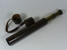 A Leather Cased Two Draw Brass Telescope