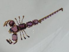 An 18ct Gold With Amethyst Scorpion Brooch