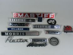 A Quantity Of Car Badges