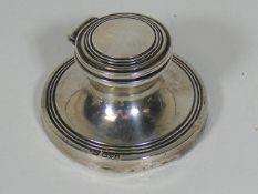 A Small Silver Capstan Ink Well