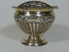 A Small Silver Rose Bowl With Embossed Decor