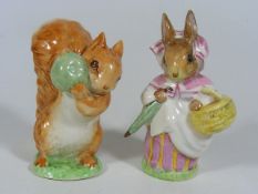 A Beswick Beatrix Potter Mrs. Rabbit, Gold Oval Wi