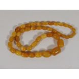A Set Of Antique Amber Beads Approx. 33g Inclusive