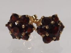 A Pair Of 18ct Gold With Garnet Ear Rings