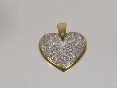 An 18ct Gold Diamond Heart Pendant