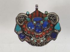 An Antique White Metal Pendant With Turquoise, Cor