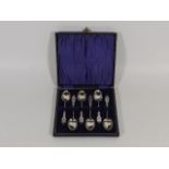 A Cased Set Of Decorative Silver Spoons