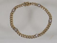 A 9ct Gold Bracelet Set With Five Diamonds