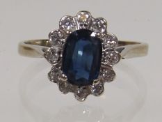 An 18ct White Gold Diamond & Sapphire Ring