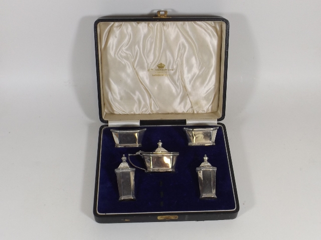 A Cased Five Piece Silver Cruet Set