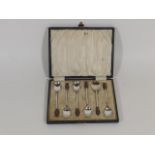 A Cased Set Of Coffee Bean Style Silver Teaspoons