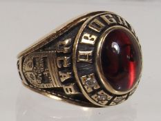 A 10k Gradution Ring With Red Opaque Stone Over Sc