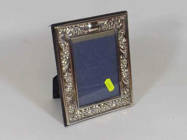 A Hallmarked Embossed Silver Photo Frame