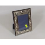 A Hallmarked Embossed Silver Photo Frame