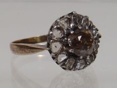 A 19thC. Ring With Champagne Coloured Centre Diamo
