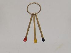 A 9ct Gold Novelty Match Stick Pendant