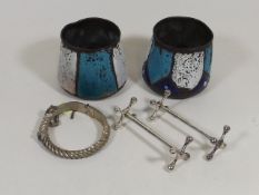 Two Chinese White Metal Knife Rests, A Bracelet &