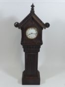 A French Miniature Long Case Mantle Clock