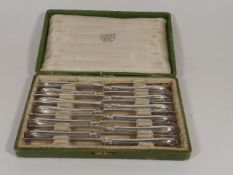A Solid Silver French Knife Set