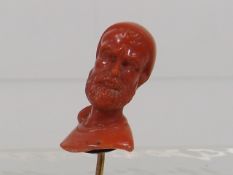 A 19thC. Italian Carved Coral Mounted On Gold Pin