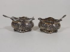 A Pair Of Ornate Silver Salts With Liners & Spoons