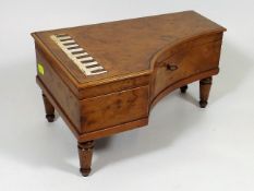 A Walnut Music Box As A Piano