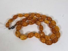 A Victorian Set Of Natural Amber Beads
