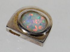 A Silver Mounted Opal D Shaped Pendant