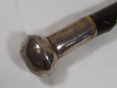 A Gents Robust Walking Cane With Chinese Silver Kn