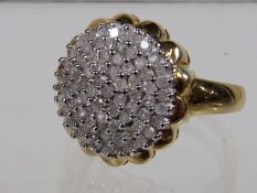 A Ladies 9ct Gold Diamond Cluster Ring
