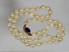 A Good Set Of Cultured Pearls With Gold Clasp Set