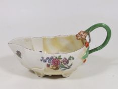 An 18thC. Chelsea Porcelain Sauceboat With Old Res