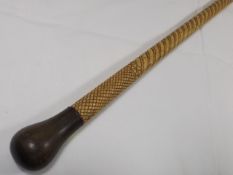 A 19thC. Carved Whale Bone Cane With Brass Tip