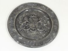 An Antique Pewter Plate Bearing Plymouth Coat Of A