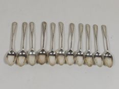 A Set Of Eleven Small Silver Spoons