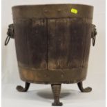 A Brass Bound Oak Log Box With Brass Claw Feet