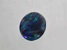 An Unmounted Black Opal