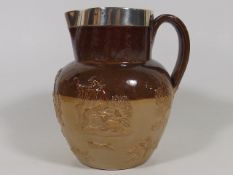 A Royal Doulton Harvest Jug With Silver Top
