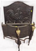 A Cast Iron Fire Grate With Dogs & Back Panel