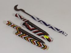 Two African Daggers In Beaded Sheafs & A Similar R