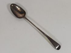 A Georgian Silver Basting Spoon