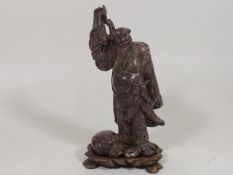 A 19thC. Oriental Soapstone Figure On Rosewood Bas