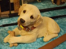 A Large Life Like Resin Labrador Puppy, Signed To