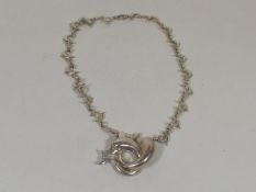 A Decorative White Metal Necklace