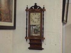 An Inlaid 19thC. Wall Clock With Mirrored Pendulum